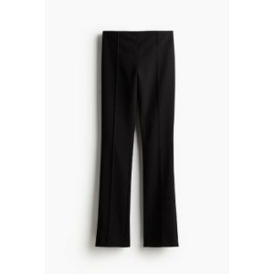 Pantaloni eleganti stransi pe corp