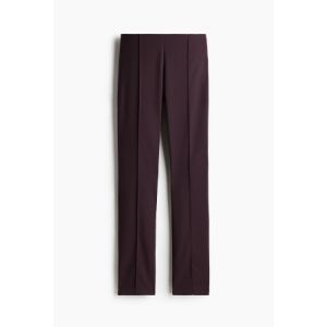 Pantaloni eleganti stransi pe corp